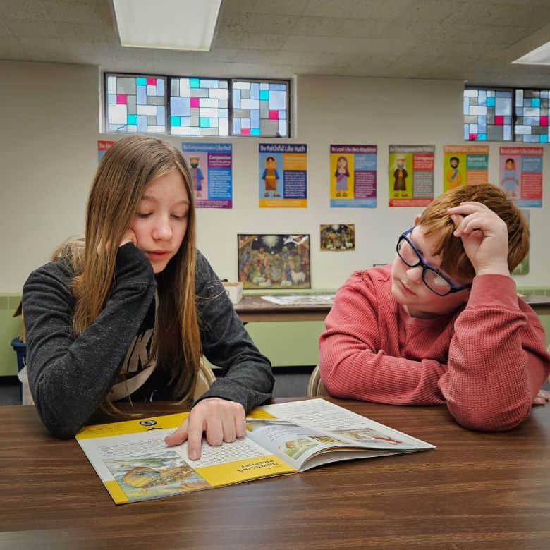 Girl and boy reading from book during Sunday School at Bethlehem Lutheran Church in West Dundee, IL